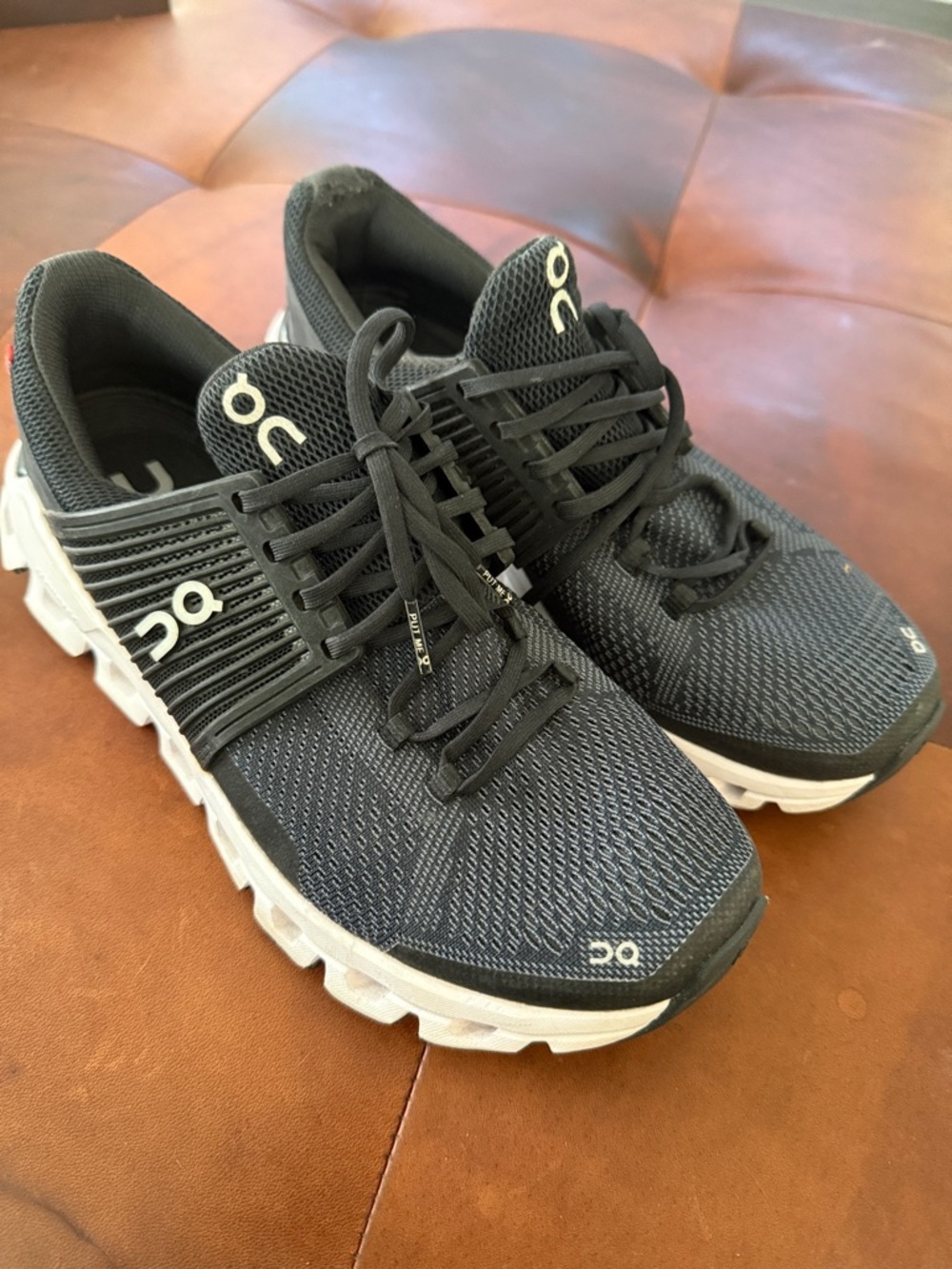 On Running Women's Black and White Running Sneakers